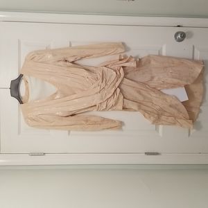 Backless, draped bodice, slit in front. Have matching lace